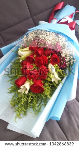 red rose bouquet lily bouquet Royalty-Free Stock Photo #1342866839