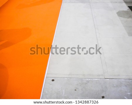 prepare set up  exhibition wood floor and sticking double tape under orange carpet