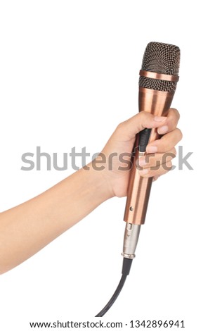 hand holding golden microphone isolated on white background
