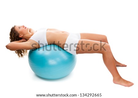 Young woman exercising on white background