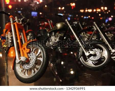 Many motorcycle models are placed in the showcase.