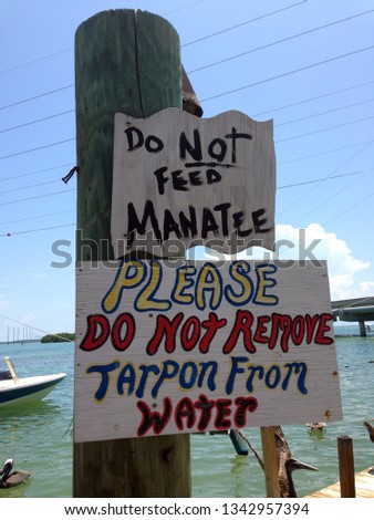 Do Not Feed Manatee Sign Do Not Remove Tarpon From Water Sign