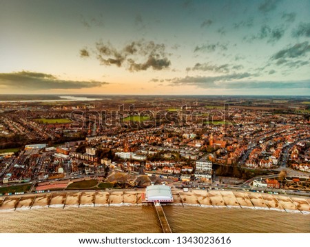 Aerial view of the Port of Felixstowe with cranes and sea side Royalty-Free Stock Photo #1343023616