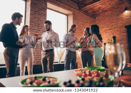 Company of six nice trendy attractive pretty elegant cheerful glad positive caucasian guys ladies pairs pal having fun luncheon brunch best tradition table buffet snack in industrial loft room Royalty-Free Stock Photo #1343041922