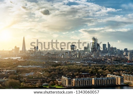 The London skyline with the various modern skyscrapers and buildings during sunset time, UK