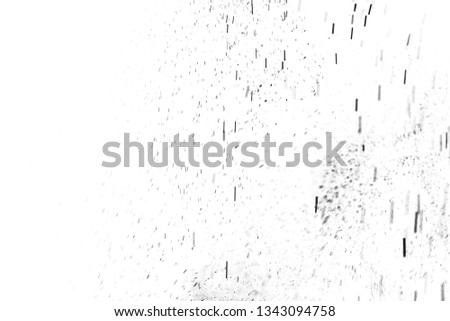 
  Black particles explosion isolated on white background. Abstract dust overlay texture.