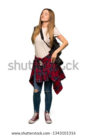 Full body Young photographer woman suffering from backache for having made an effort on isolated background