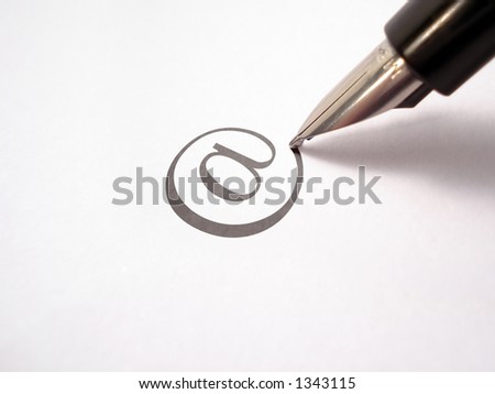 Pen writing an arroba. Royalty-Free Stock Photo #1343115