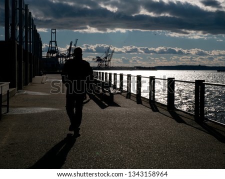 Person Silhouette at Pier 5 in Brooklyn, New York City.