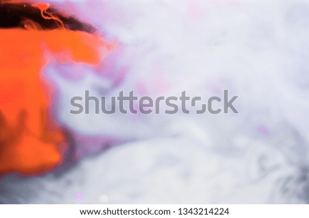 Motion Color drop in water,Ink swirling in water,Colorful ink in water abstraction.Fancy Dream Cloud of ink in water soft focus 