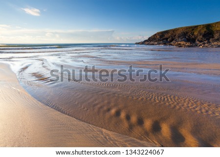 Evening on the beach at Poldhu Cove Cornwall England UK Europe