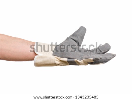 Worker showing outstretched palm gesture - offering or begging concept. Male hand wearing working glove, isolated on white background.