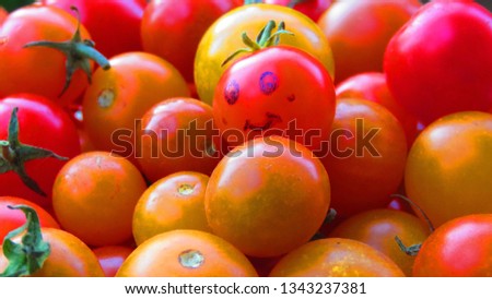 A pic of cute little tomatoes. Picture shows one's uniqueness.