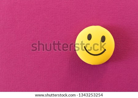 Funny smiley face on purple background. Positive mood. Empty text space