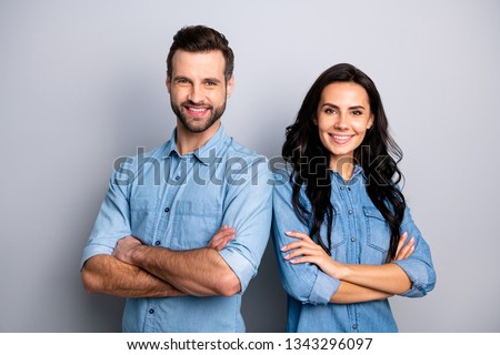 Portrait of charming charismatic freelancers entrepreneurs ready to solve business work problems take decisions. Wearing blue denim jackets isolated on ashy-gray background Royalty-Free Stock Photo #1343296097