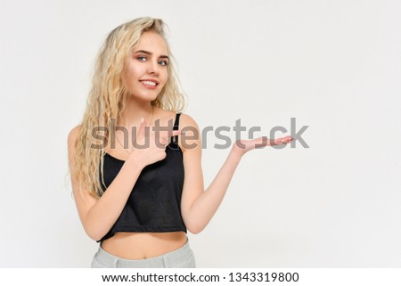Beauty Woman face Portrait. Beautiful Spa model Girl with Perfect Fresh Clean Skin. Photo of blond female model with white teeth looking at camera and smiling. Isolated on a white background