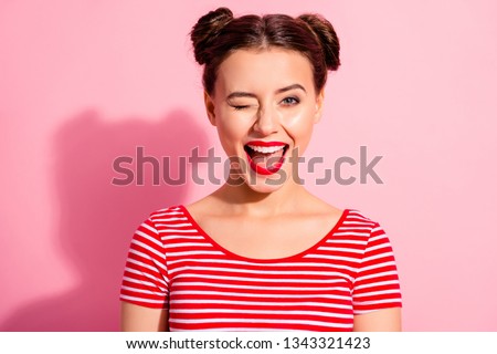 Close up photo beautiful she her lady pretty hairdo two buns bright pomade allure tempting big lips blinking boyfriend send love waves wear casual striped red white t-shirt isolated pink background