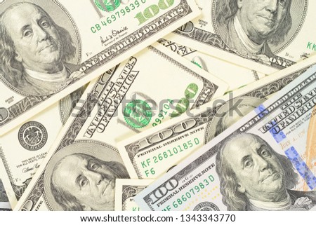 One hundred dollars banknotes background, high resolution photo of money close up macro.