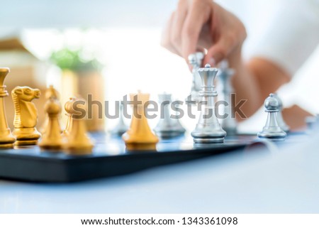 strategy business ideas concept with chess board game with hand choice turn solution