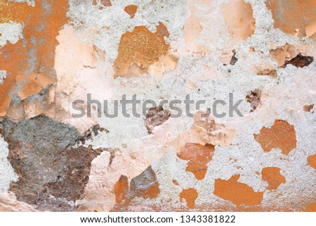 Close up detailed surface of weathered paint on different walls in high resolution
