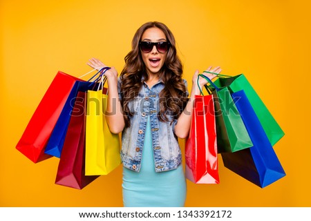 Close up photo beautiful her she lady yell scream shout enjoy new staff shopping spree excited low prices wear specs blue teal green short dress jeans denim jacket clothes isolated yellow background