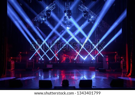 Free stage with lights, lighting devices. Royalty-Free Stock Photo #1343401799