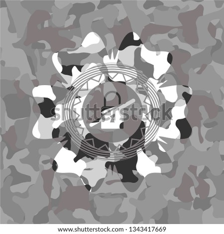 inaccessible icon inside grey camouflage emblem