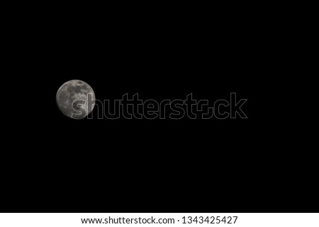 the moon in black background