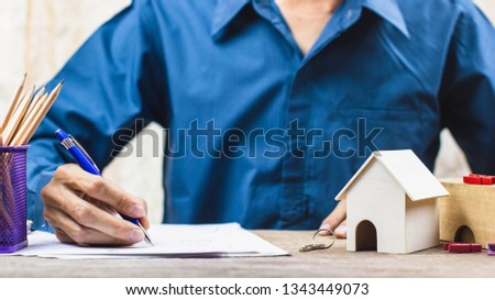Home loan, Reverse mortgage concept. Estate agent sign the certification contract. Depicts the completion of the agreement in the home trading. Conceptual real estate investment.