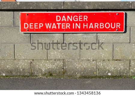 Deep water danger in harbour sign