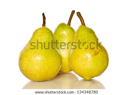 few ripe pears on a white background