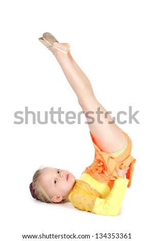 Little gymnast girl isolated on white background