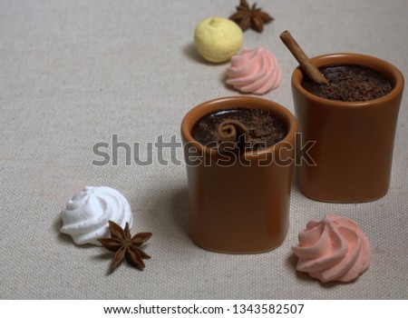Hot dark Chocolate in clay Cups.