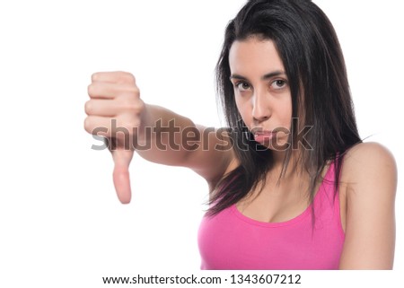 dissatisfied and angry woman showing thumbs down