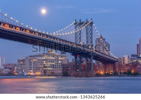 Moon Rising Over The Manhattan Bridge in NYC