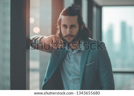 Portrait Business Man in Suit in Model Office. Business man, Lifestyle Relex and Happiness. The Success Business People Corporation Concept.