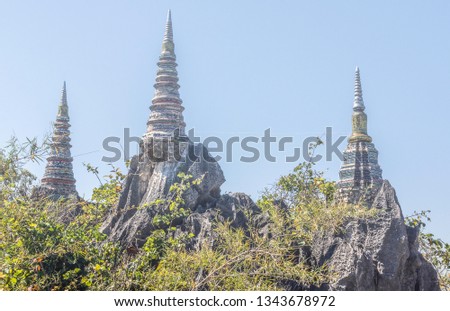 Landscape nature Wat chaloem phrachomklao rachanuson,Pagoda on rock mountain in sunshine beautiful architecture landmark Lampang,Thailand.