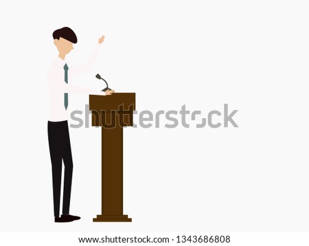 The pleasant man speaking from the rostrum. Businessman or speaker speech. Rector in the classroom
