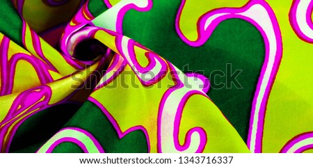 silk abstract fabric This luxurious silk chiffon fabric is a show-stopper. It is transparent has a liquid drape and is very soft. Perfect for your projects. Colors include green yellow white and pink