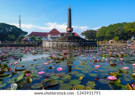 Tugu Malang as the main landmark of Malang City in East Java, Indonesia Royalty-Free Stock Photo #1343931791