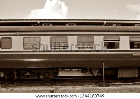 Side view of old vintage bogie of diesel electric locomotive train on railroad track, Take picture from the platform.