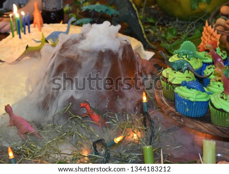 dinosaur birthday cake with volcano