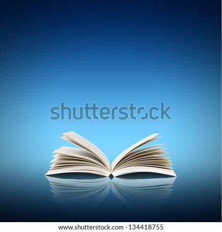 Open book isolated on blue background