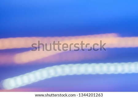Abstract background, defocused textures and modern design concept - Evening city lights in motion