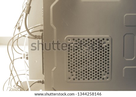 side view of CPU case of PC computer with cable wire connect to monitor