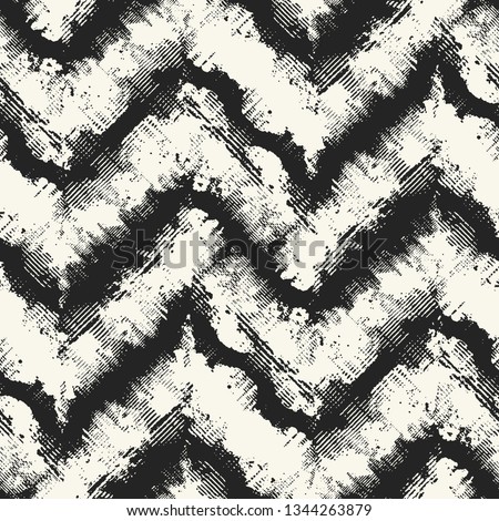 Monochrome Paint-Splattered Effect Chevron Graphic Motif. Seamless Pattern.
