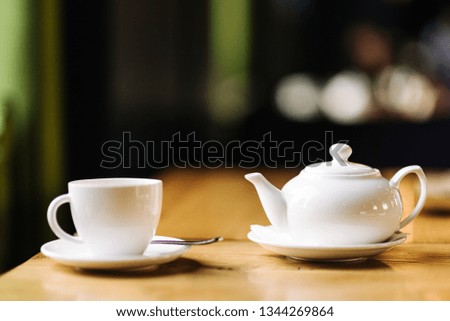 cup of tea at cafe blurred background