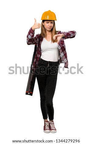 A full-length shot of a Architect woman making good-bad sign. Undecided between yes or not over isolated white background