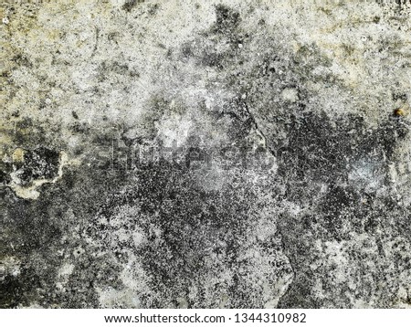 Close-up photo background, top view of details texture concrete loft style with 
grunge and black stains with cracks and fissures on surface, 
old and age grey cement wall wiht dirty rough
