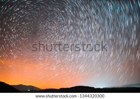 Beautiful sky star trails . Starry night landscape.